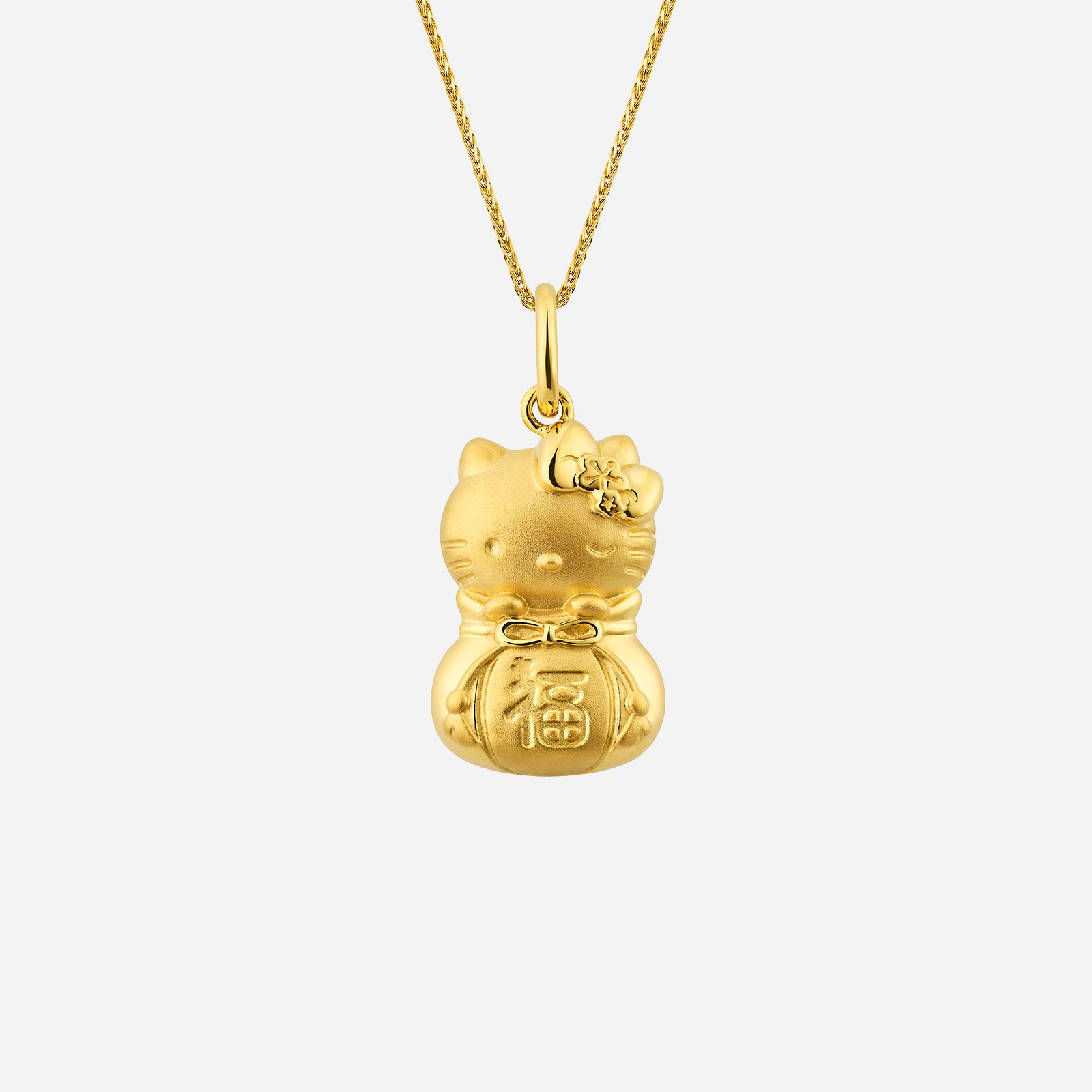 Poh Heng Hello Kitty Golden Pouch Pendant in 22K Yellow Gold	